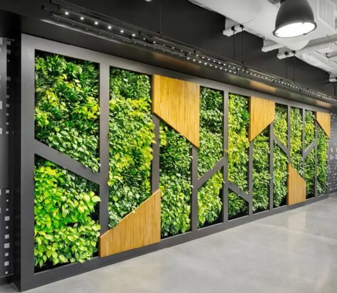 Vertical garden wall with orange and green plant design