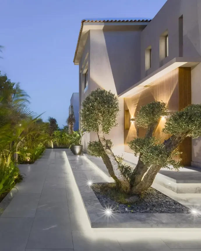 Residential garden entrance with symmetrical plant decor